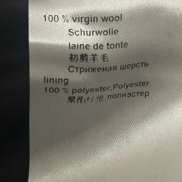 Marc Cain knit black knee length skirt with metallic silver side seams. - Picture 9 of 14